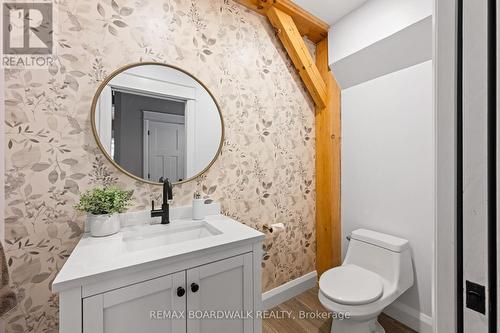 2pc Bath off Kitchen - Main Level - 4701 4Th Concession Road, Augusta, ON - Indoor Photo Showing Bathroom