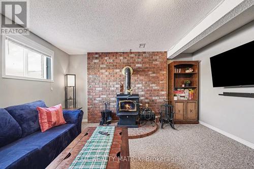 39 Lapointe Boulevard, Russell, ON - Indoor Photo Showing Living Room With Fireplace