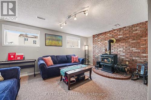 39 Lapointe Boulevard, Russell, ON - Indoor Photo Showing Living Room With Fireplace