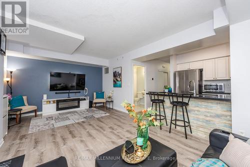 1034 - 3045 Finch Avenue E, Toronto, ON - Indoor Photo Showing Living Room