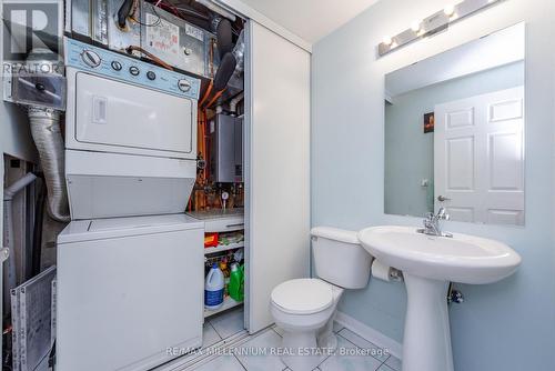 1034 - 3045 Finch Avenue E, Toronto, ON - Indoor Photo Showing Laundry Room
