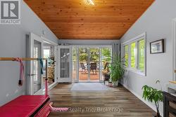 Main Floor Muskoka Room with walkout to Lake - 