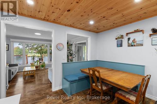 Dining looking into living room and over lake - 210 Burnett'S Road, Mckellar, ON - Indoor Photo Showing Dining Room