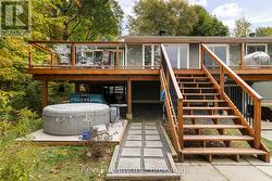 hot tub and stairs to main level - 