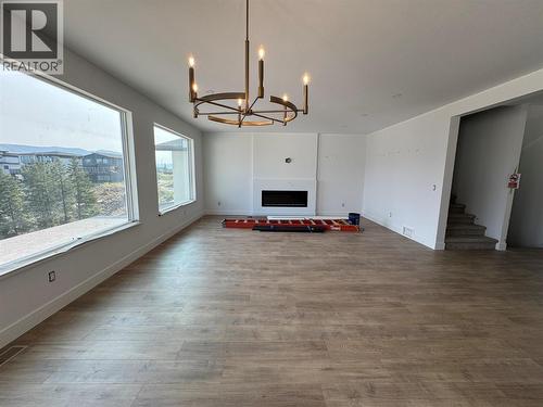Dining/Living - 2170 Galore Crescent, Kamloops, BC - Indoor With Fireplace