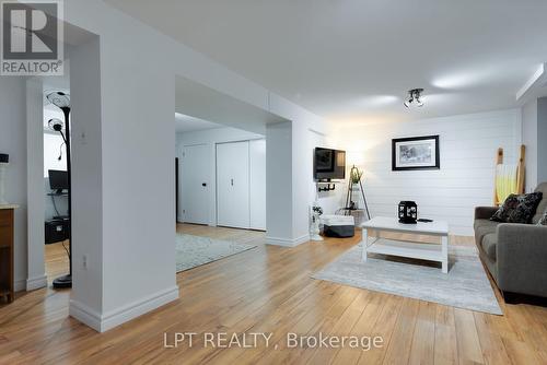 34 Cedar Creek Road, Springwater, ON - Indoor Photo Showing Living Room With Fireplace