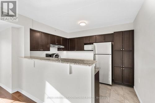 310 - 1470 Main Street E, Milton, ON - Indoor Photo Showing Kitchen