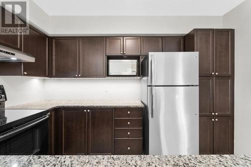 310 - 1470 Main Street E, Milton, ON - Indoor Photo Showing Kitchen