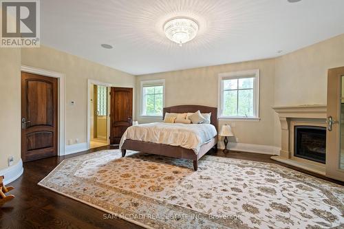 839 Lakeshore Road, Port Colborne, ON - Indoor Photo Showing Bedroom With Fireplace