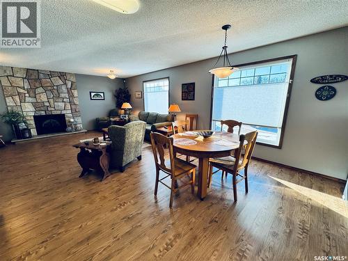 403 8Th Avenue W, Biggar, SK - Indoor Photo Showing Dining Room With Fireplace