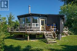 Back deck with stairs to back yard - 