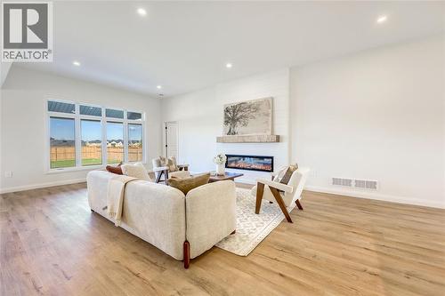3515 Mia Lane, Plympton-Wyoming, ON - Indoor Photo Showing Living Room With Fireplace