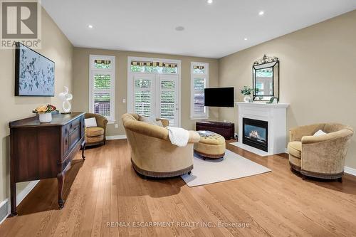 4 - 8 Muscat Drive, Grimsby, ON - Indoor Photo Showing Living Room With Fireplace