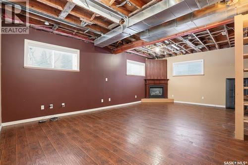 5 4Th Avenue N, Martensville, SK - Indoor Photo Showing Basement With Fireplace