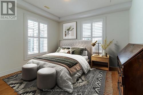 Virtually Staged - 308 - 25 Beaver Street S, Blue Mountains, ON - Indoor Photo Showing Bedroom