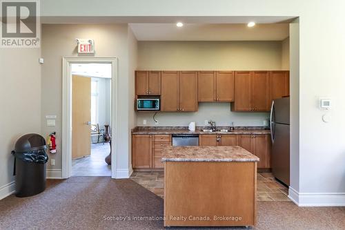 Community Kitchen - 308 - 25 Beaver Street S, Blue Mountains, ON - Indoor Photo Showing Kitchen With Double Sink