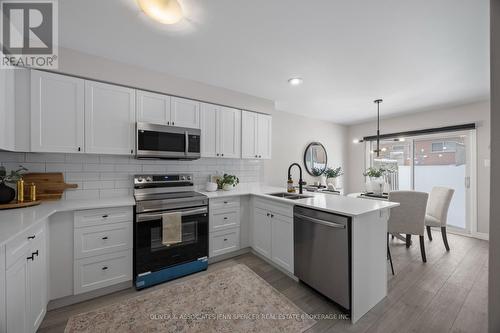 66 - 601 Grenfell Drive, London North (North C), ON - Indoor Photo Showing Kitchen With Double Sink