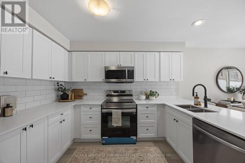 66 - 601 Grenfell Drive, London North (North C), ON - Indoor Photo Showing Kitchen With Double Sink
