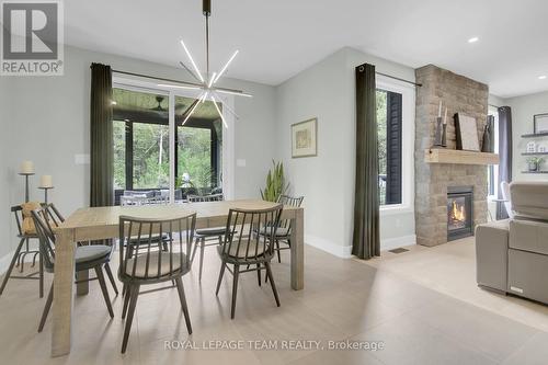295 Ridgemont Drive, Beckwith, ON - Indoor Photo Showing Dining Room With Fireplace