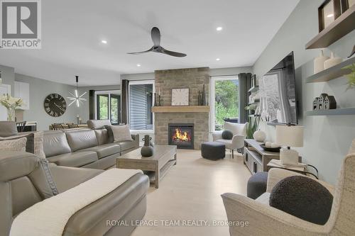 Reclaimed wood mantle above fireplace - 295 Ridgemont Drive, Beckwith, ON - Indoor Photo Showing Living Room With Fireplace