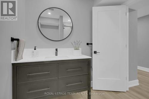Quartz vanity in L/L bathrm - 295 Ridgemont Drive, Beckwith, ON - Indoor Photo Showing Bathroom