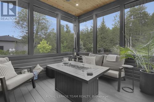 Fabulous screened in porch to enjoy bug free! - 295 Ridgemont Drive, Beckwith, ON -  With Deck Patio Veranda With Exterior