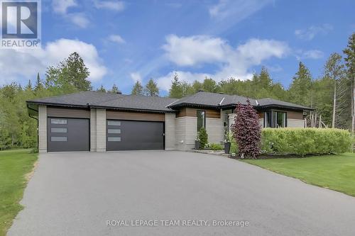Huge 3 car garage w/insulated doors - 295 Ridgemont Drive, Beckwith, ON - Outdoor