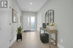 Front entrance/foyer feature porcelain tile floors - 