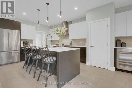 Custom designed kitchen by Deslauriers Kitchens - 295 Ridgemont Drive, Beckwith, ON - Indoor Photo Showing Kitchen With Upgraded Kitchen