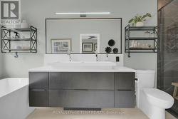 Quartz topped vanity w/double faucets - 