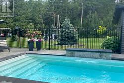 Soothing waterfall feature & modular fencing! - 