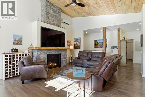 7145 Dunwaters Road, Kelowna, BC - Indoor Photo Showing Living Room With Fireplace
