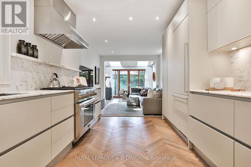 Calcutta marble counters and backsplash - 69 Sullivan Street, Toronto, ON - Indoor Photo Showing Kitchen With Upgraded Kitchen