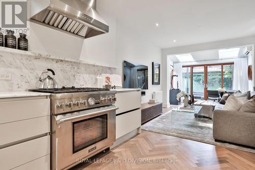 Professional gas range and integrated appliances - 69 Sullivan Street, Toronto, ON - Indoor Photo Showing Kitchen With Upgraded Kitchen