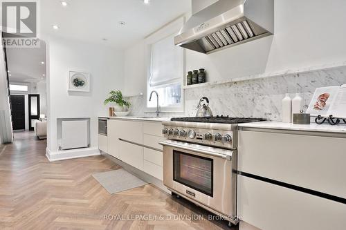 Multiple workspaces with window & Euro rads - 69 Sullivan Street, Toronto, ON - Indoor Photo Showing Kitchen With Upgraded Kitchen