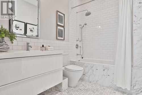 Main 4-piece Calcutta marble bath, heated floors - 69 Sullivan Street, Toronto, ON - Indoor Photo Showing Bathroom