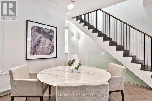 Dining room and main stairs - 69 Sullivan Street, Toronto, ON - Indoor Photo Showing Dining Room