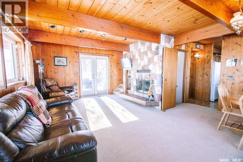 Mccoy Acreage, Dufferin Rm No. 190, SK - Indoor Photo Showing Living Room With Fireplace