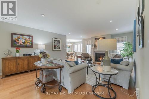 Open Concept from Living Room - 11 Hollier Drive, Tillsonburg, ON - Indoor Photo Showing Living Room With Fireplace