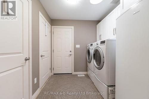 Main Level Laundry - 11 Hollier Drive, Tillsonburg, ON - Indoor Photo Showing Laundry Room