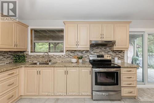 3 51St Street, Wasaga Beach, ON - Indoor Photo Showing Kitchen With Double Sink
