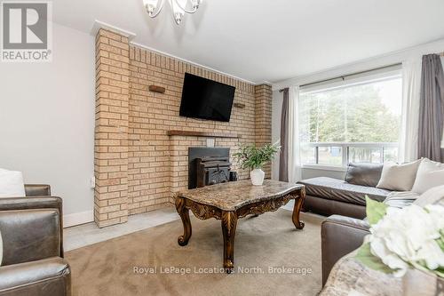 3 51St Street, Wasaga Beach, ON - Indoor Photo Showing Living Room With Fireplace