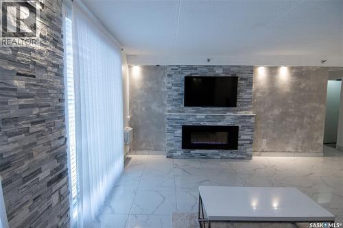 221 4045 Rae Street, Regina, SK - Indoor With Fireplace
