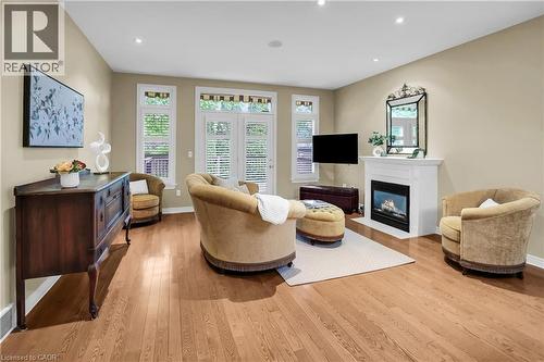 8 Muscat Drive Unit# 4, Grimsby, ON - Indoor Photo Showing Living Room With Fireplace