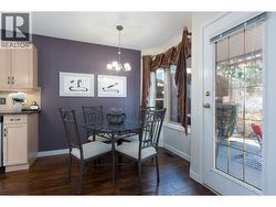 Kitchen table looks out to nature. - 