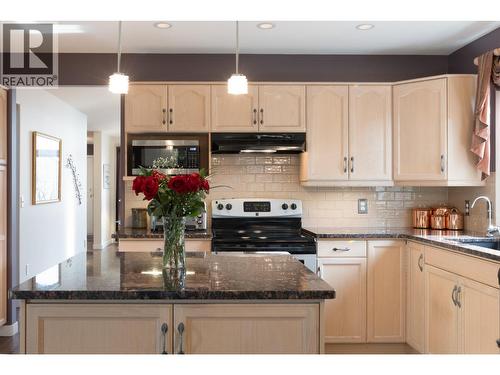 Island in Kitchen - 2330 Butt Road Unit# 449, West Kelowna, BC - Indoor Photo Showing Kitchen