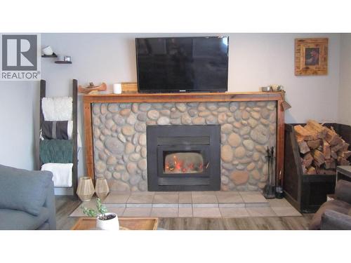 6313 Archie Meadow Road, Forest Grove, BC - Indoor Photo Showing Living Room With Fireplace