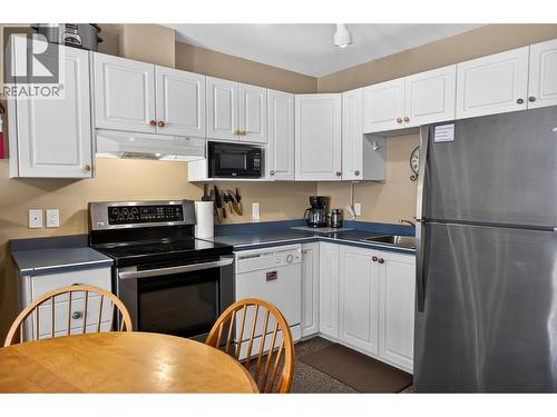 400 Riverside Way Unit# 438, Fernie, BC - Indoor Photo Showing Kitchen With Double Sink