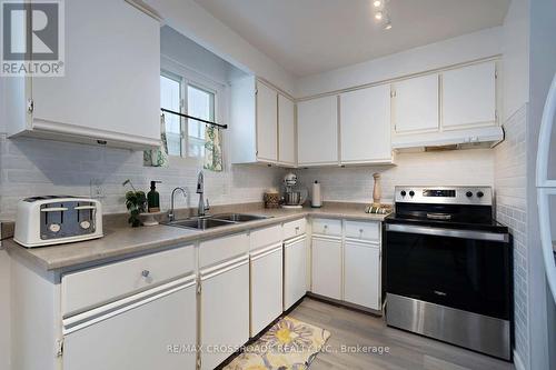 184 Collings Avenue, Bradford West Gwillimbury, ON - Indoor Photo Showing Kitchen With Double Sink