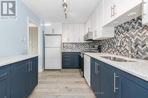 214 - 1505 Baseline Road, Ottawa, ON - Indoor Photo Showing Kitchen With Double Sink